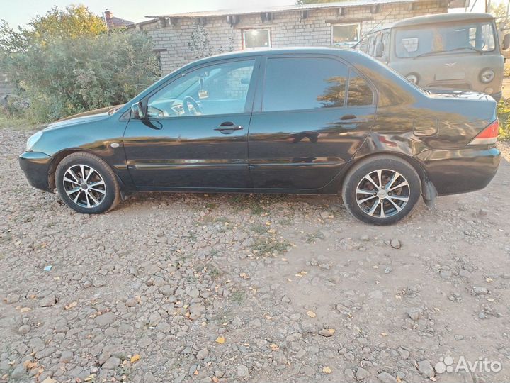 Mitsubishi Lancer 1.6 МТ, 2006, 239 000 км