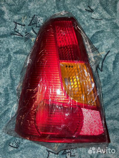 Фонарь задний левый на renault logan