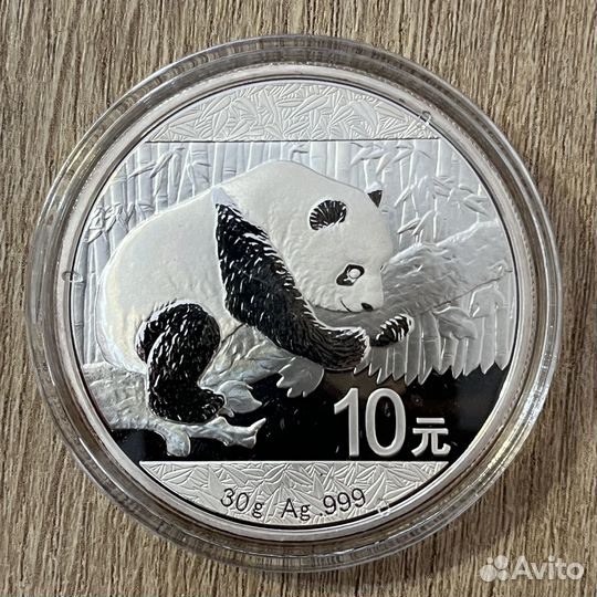 Серебряные монеты Панда Китай