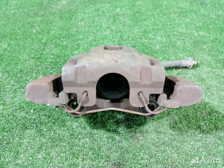 Суппорт тормозной задний левый Jeep Grand Cherokee