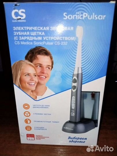 Электрическая зубная щетка