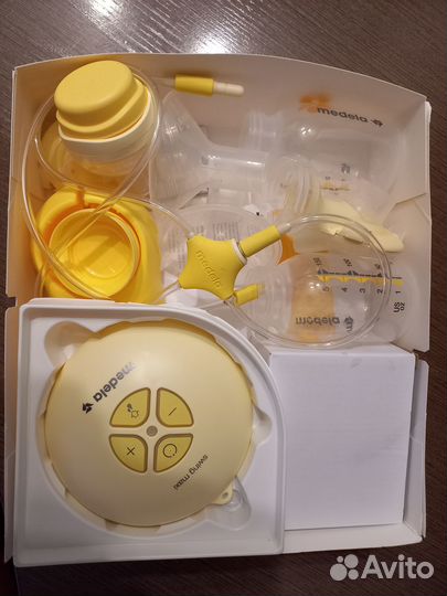 Молокоотсос медела электрический swing maxi calma