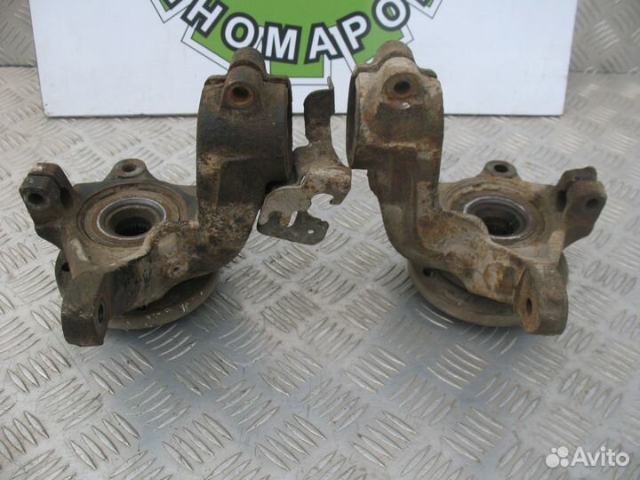 Кулак поворотный левый Peugeot Partner M49 1.4