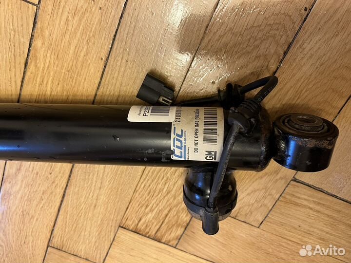 Амортизатор задний левый Cadillac SRX2