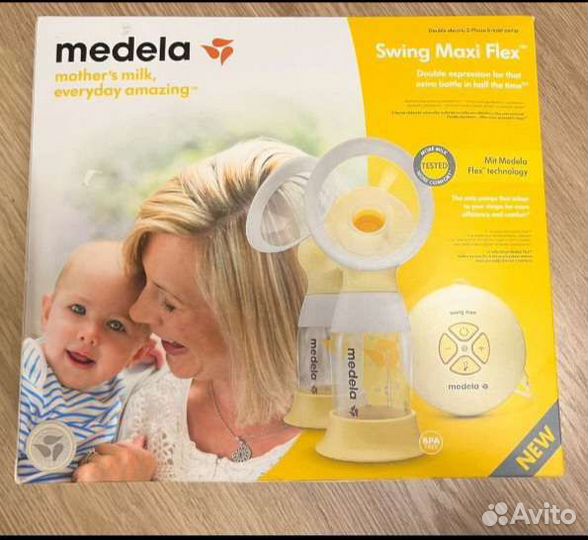 Молокоотсос medela swing maxi flex двойной