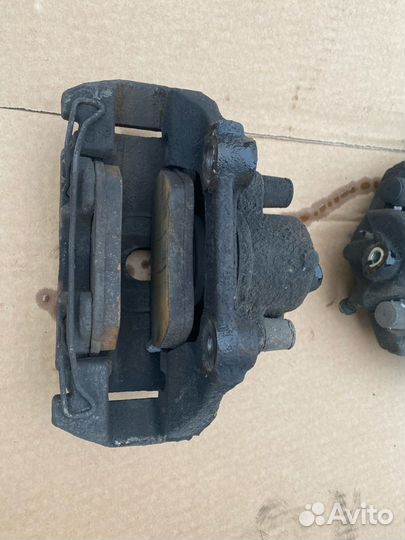 Суппорт тормозной передний Volkswagen Polo 5 sedan