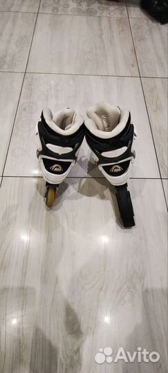 Роликовые коньки head