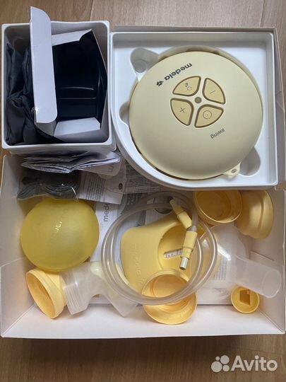 Молокоотсос medela swing электрический