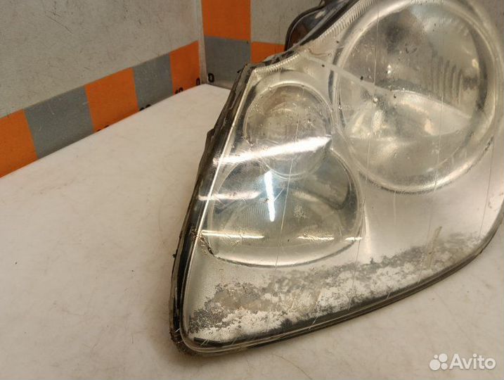 Фара левая Porsche Cayenne