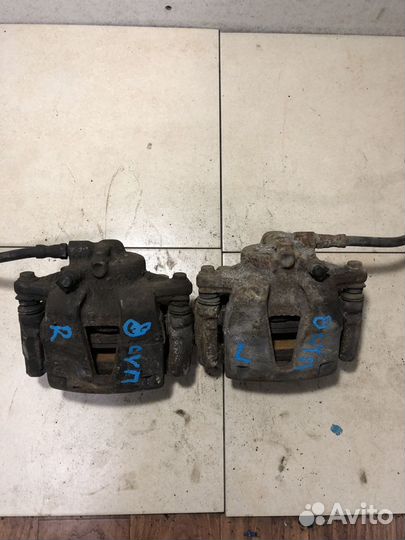 Суппорт тормозной передний Опель Корса Д