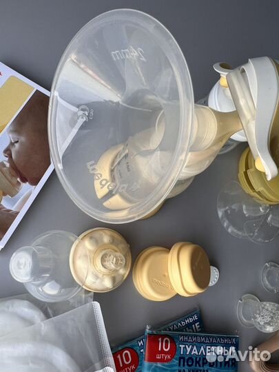 Молокоотсос medela ручной с соской, накладки