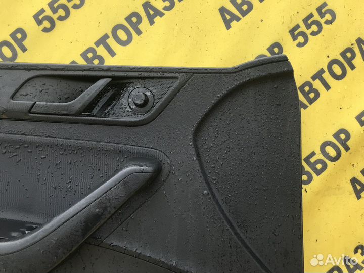 Обшивка двери передней левой Skoda Rapid