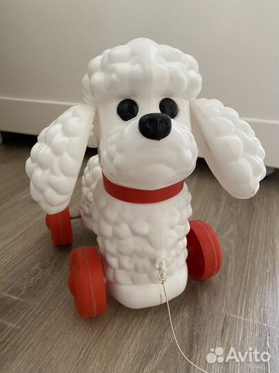 Игрушка каталка