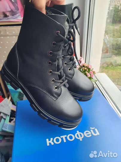 Новые кожаные ботинки