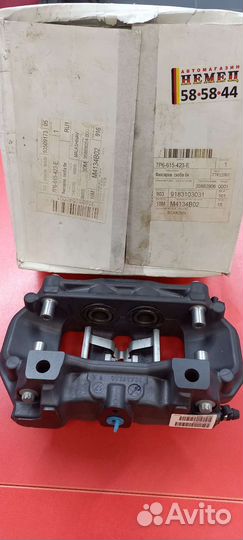 Суппорт тормозной задний левый VW Touareg 2010-18