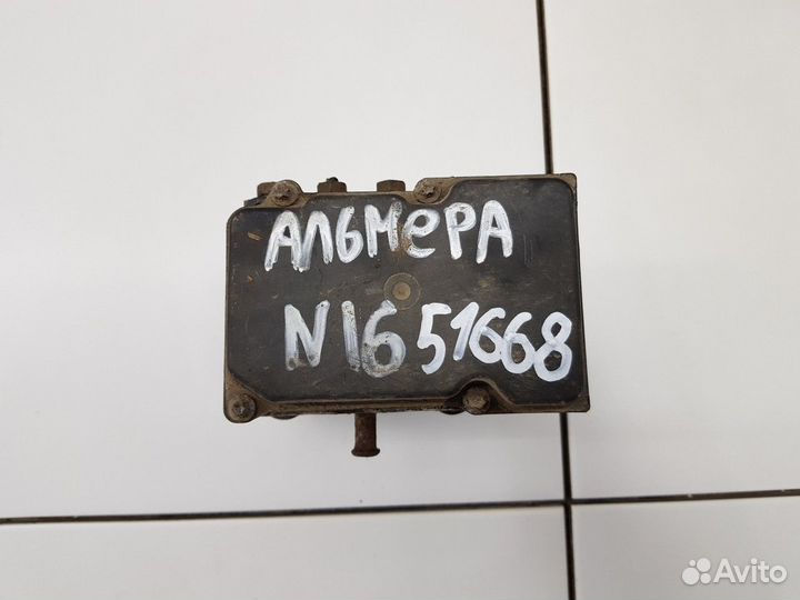 Блок ABS (насос) (Nissan Almera Classic)