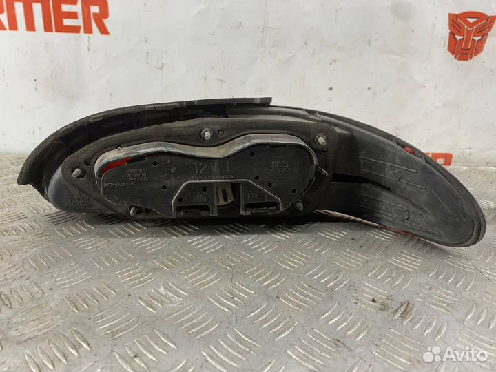 Фонарь левый Митсубиши Мираж 1993