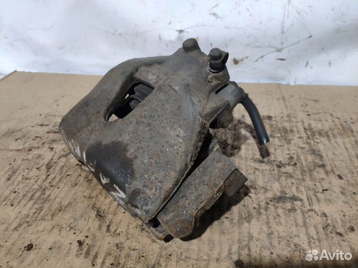 Суппорт тормозной передний Opel Zafira B, Astra H