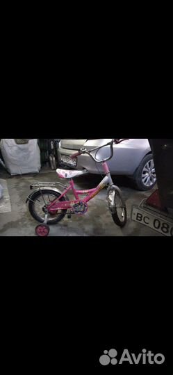 Четырехколесный велосипед