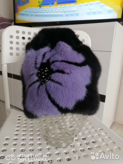 Шапки меховые женские