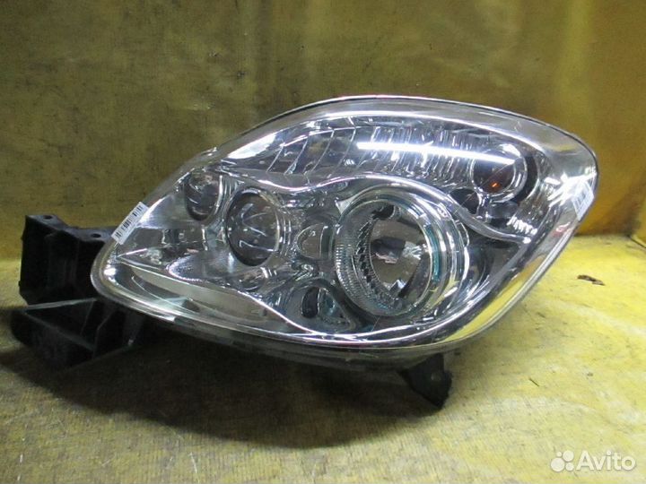 Фара левая Mazda Verisa DC5W