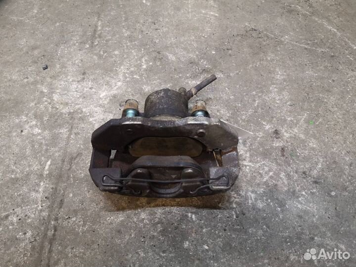 Суппорт тормозной передний правый Mazda 3 BL