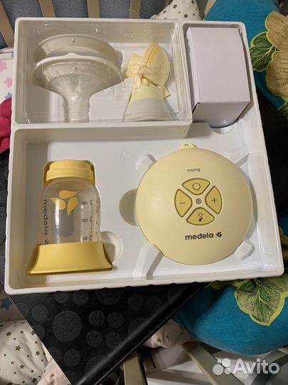Молокоотсос medela swing flex электрический