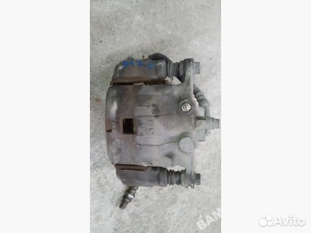 Суппорт тормозной передний правый Mazda 2 DY