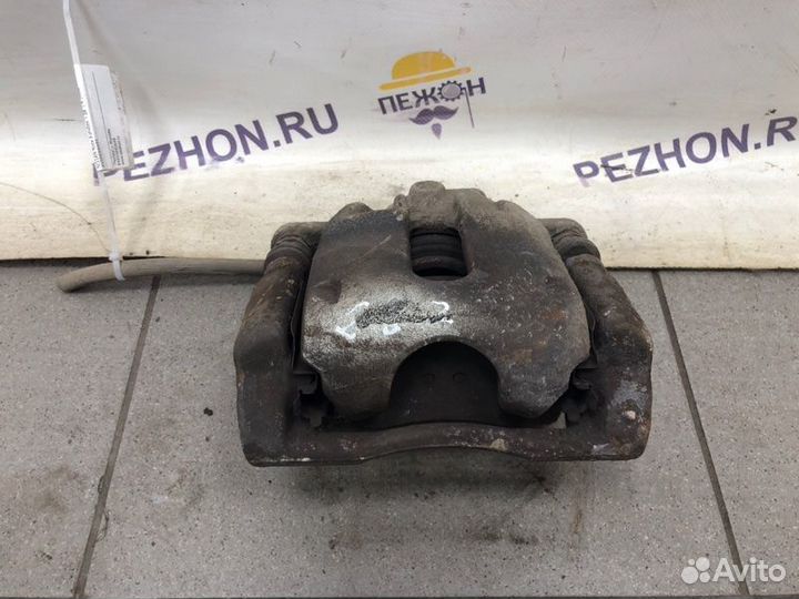 Суппорт тормозной передний правый Nissan Note