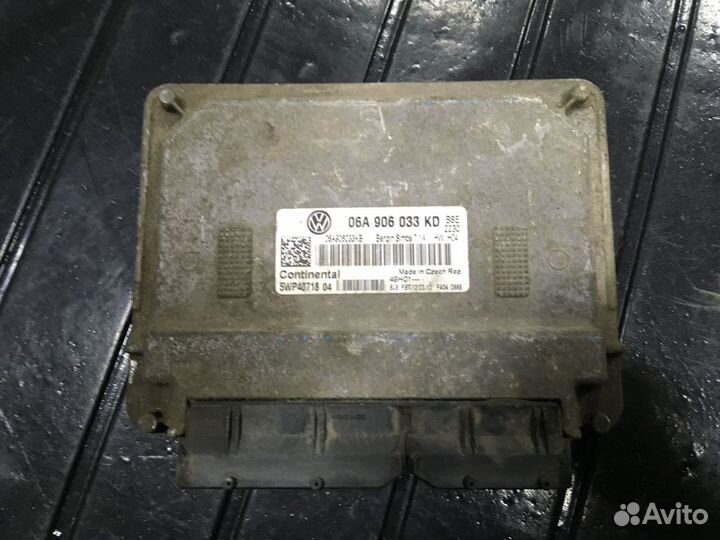 Блок управления двигателем 06A906033KD Skoda