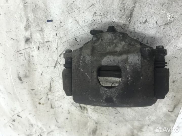 Суппорт тормозной передний правый Kia Cerato