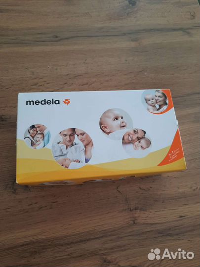 Medela молокоотсос, смартсоска, накладки на соски
