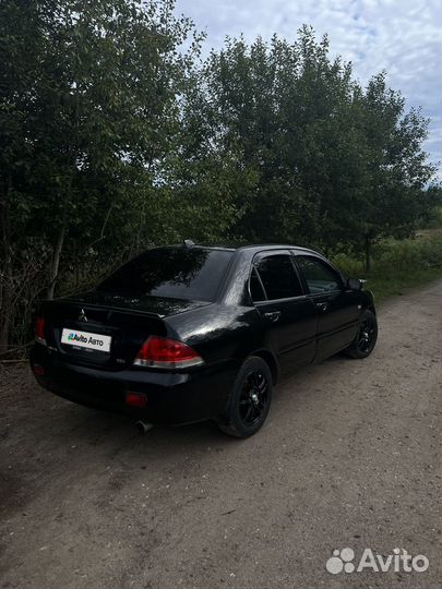 Mitsubishi Lancer 1.6 AT, 2005, 248 000 км