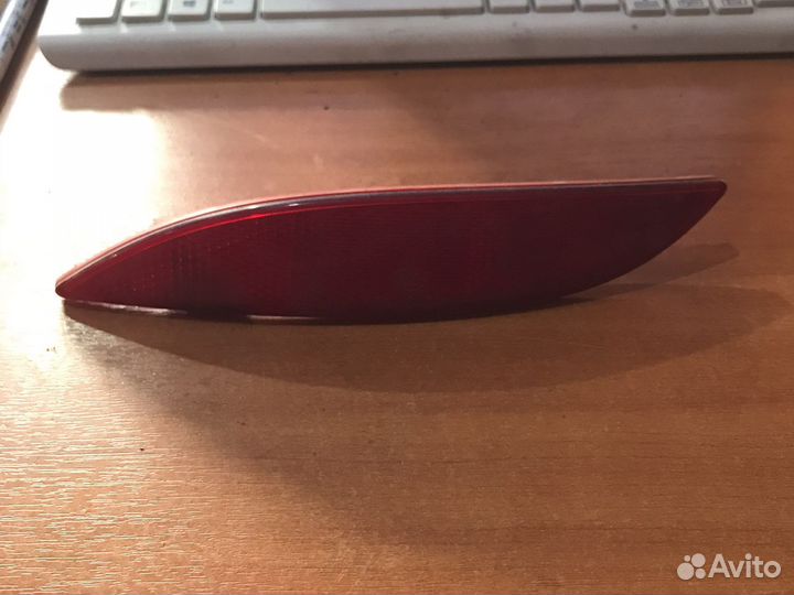 Катафот заднего бампера левый Renault Fluence 1