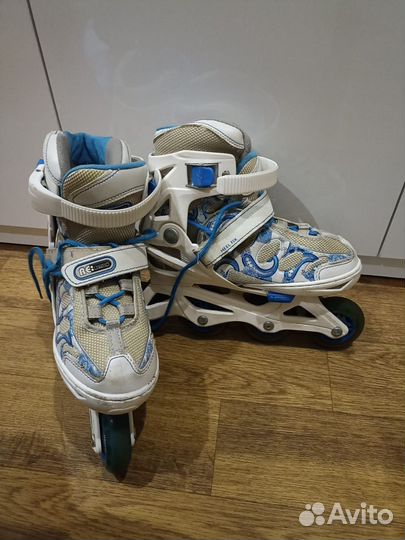 Коньки роликовые