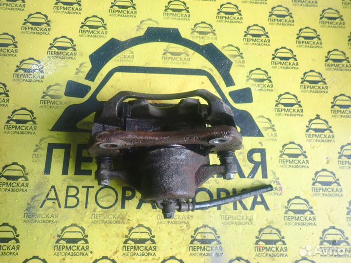 Суппорт тормозной передний правый Kia Cerato 2