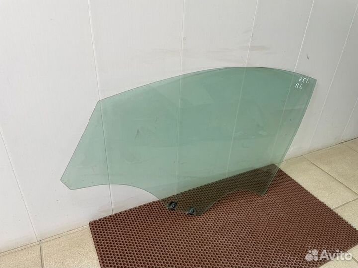 Стекло двери переднее левое Renault Logan