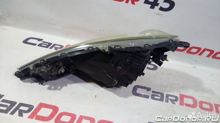 Фара головного света правая б/у для Honda Jazz (21