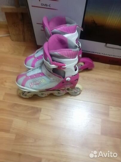 Роликовые коньки