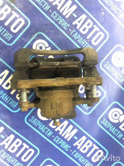 Суппорт тормозной передний левый Toyota Corolla