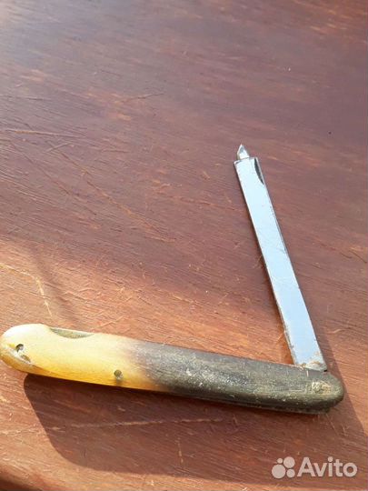 Маникюрный ножик с пилочкой