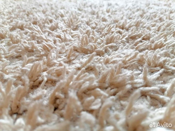 Круглый ковёр белого цвета