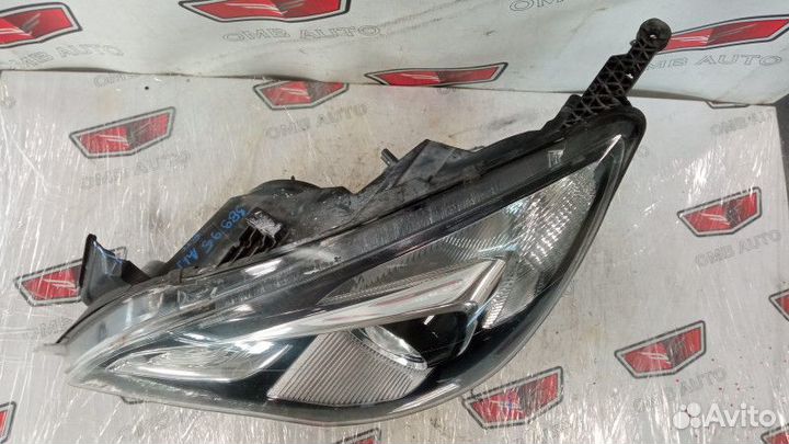 Фара левая галоген Опель Астра J GTC