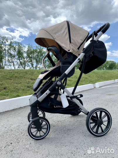 Коляска lux mom реверсивный блок