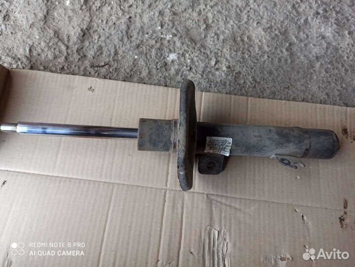 Передний амортизатор