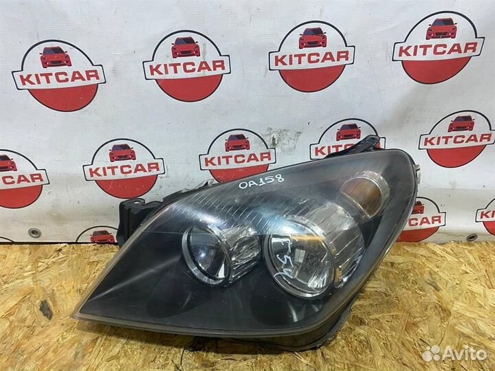 Фара левая Opel Astra H GTC