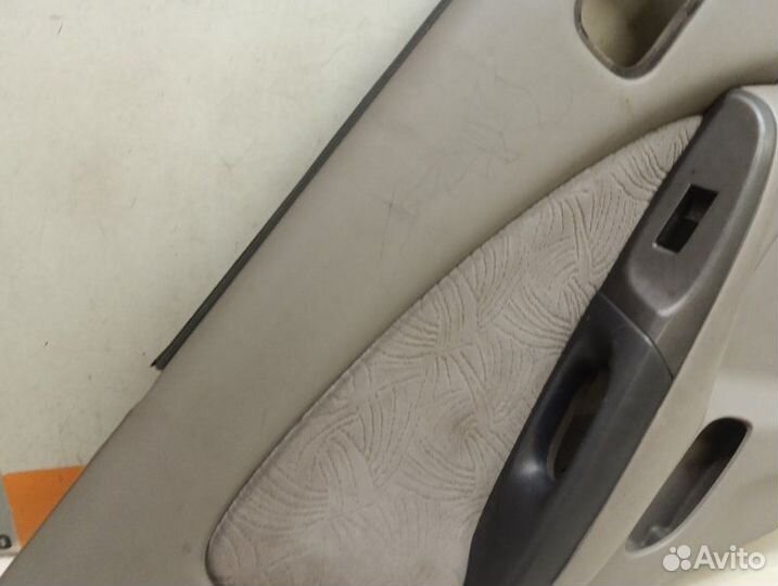 Обшивка двери задняя левая Nissan Almera N16 1.8