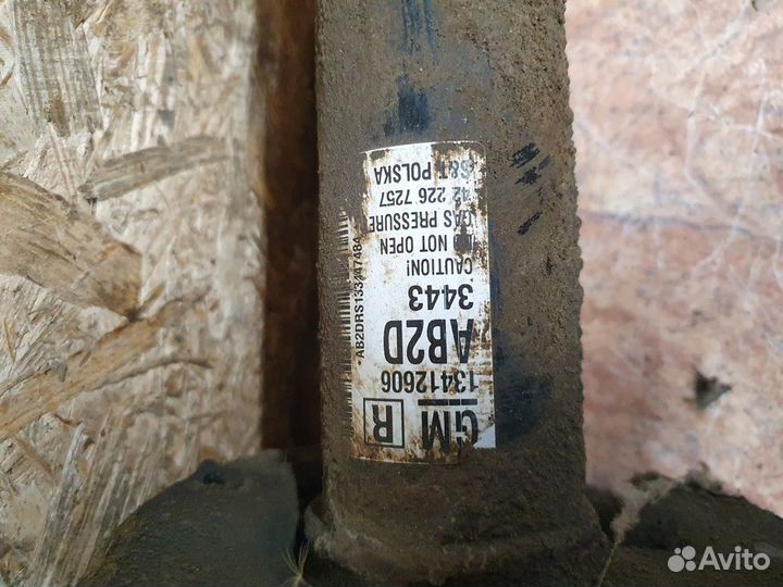 Амортизационная стойка передняя правая 1,6 МКПП Op