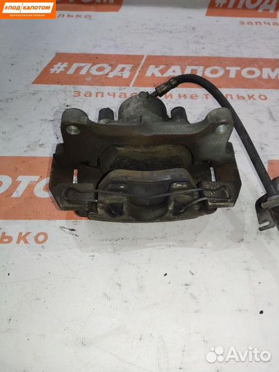 Суппорт тормозной передний правый Skoda Rapid