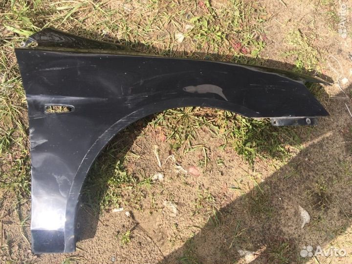 Переднее крыло Mitsubishi Lancer 10